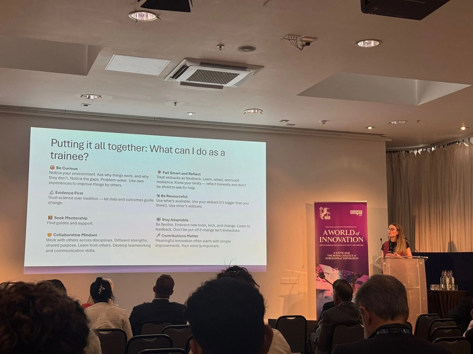 Emma Howie speaking at a conference